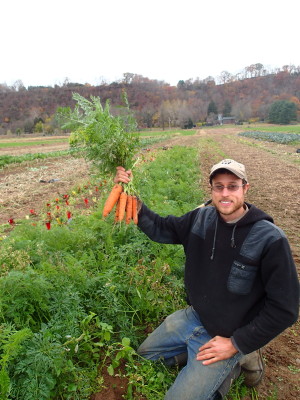 John holds up carrots