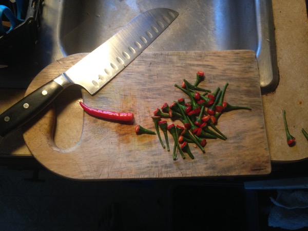 Ground Thai Peppers on Cutting Board